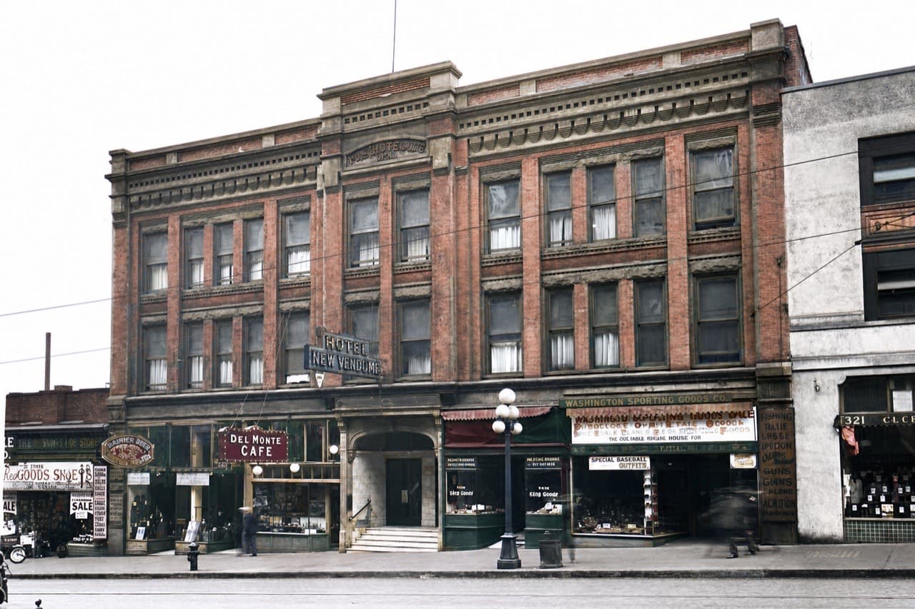 AI-colorized restoration of the Hotel New Vendome around 1926, the corner the building has held since 1890
